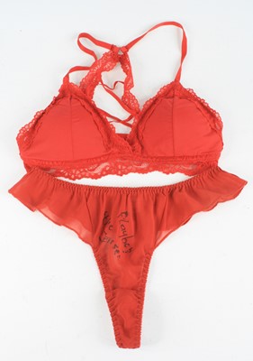 Lot 1223 - Elke Jeinsen, a red bra with lace trim, signed...