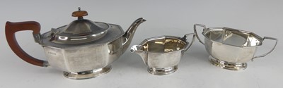 Lot 170 - An Art Deco silver three-piece tea set,...