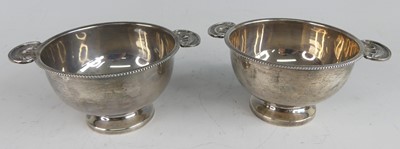 Lot 174 - A pair of late Art Deco silver quaichs, each...