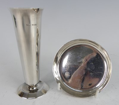 Lot 188 - A 1960s silver bud vase, of plain tapering...