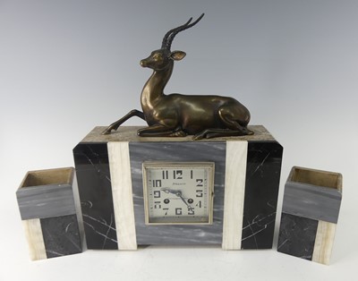 Lot 266 - An Art Deco marble clock garniture, mounted...