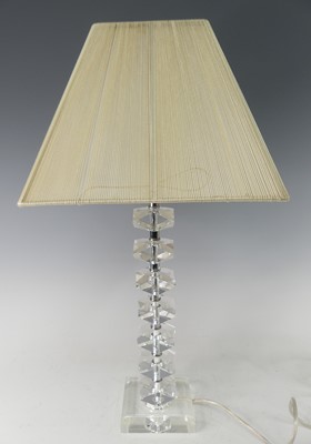 Lot 264 - A contemporary lucite and chromed metal table...