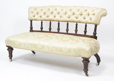 Lot 2707 - A Victorian walnut framed salon settee, the...