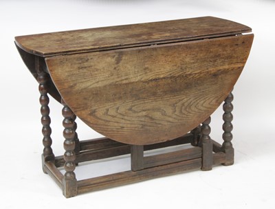 Lot 2675 - An antique joined oak gateleg table, the...