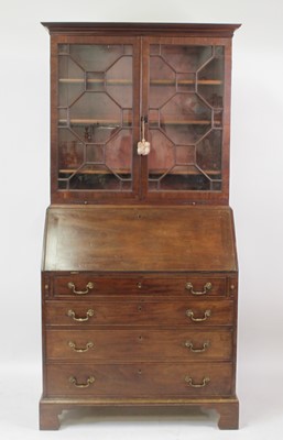 Lot 2719 - A George III mahogany bureau bookcase, the...