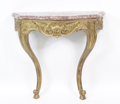 Lot 2720 - A continental giltwood and gesso marble topped...