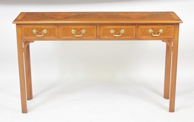 Lot 2726 - A walnut and figured walnut hall table in the...