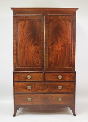 Lot 2674 - A Regency mahogany and inlaid linenpress, the...