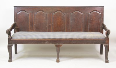 Lot 2723 - An 18th century joined oak settle, having a...