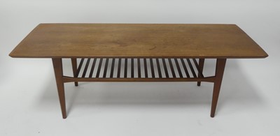 Lot 486 - A 1960s Danish teak long coffee table, having...