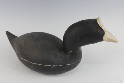 Lot 296 - A carved and painted pine decoy of an American...