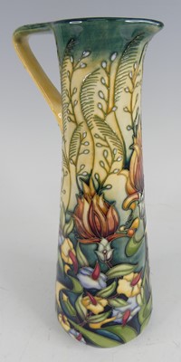 Lot 66 - A contemporary Moorcroft pottery ewer in the...