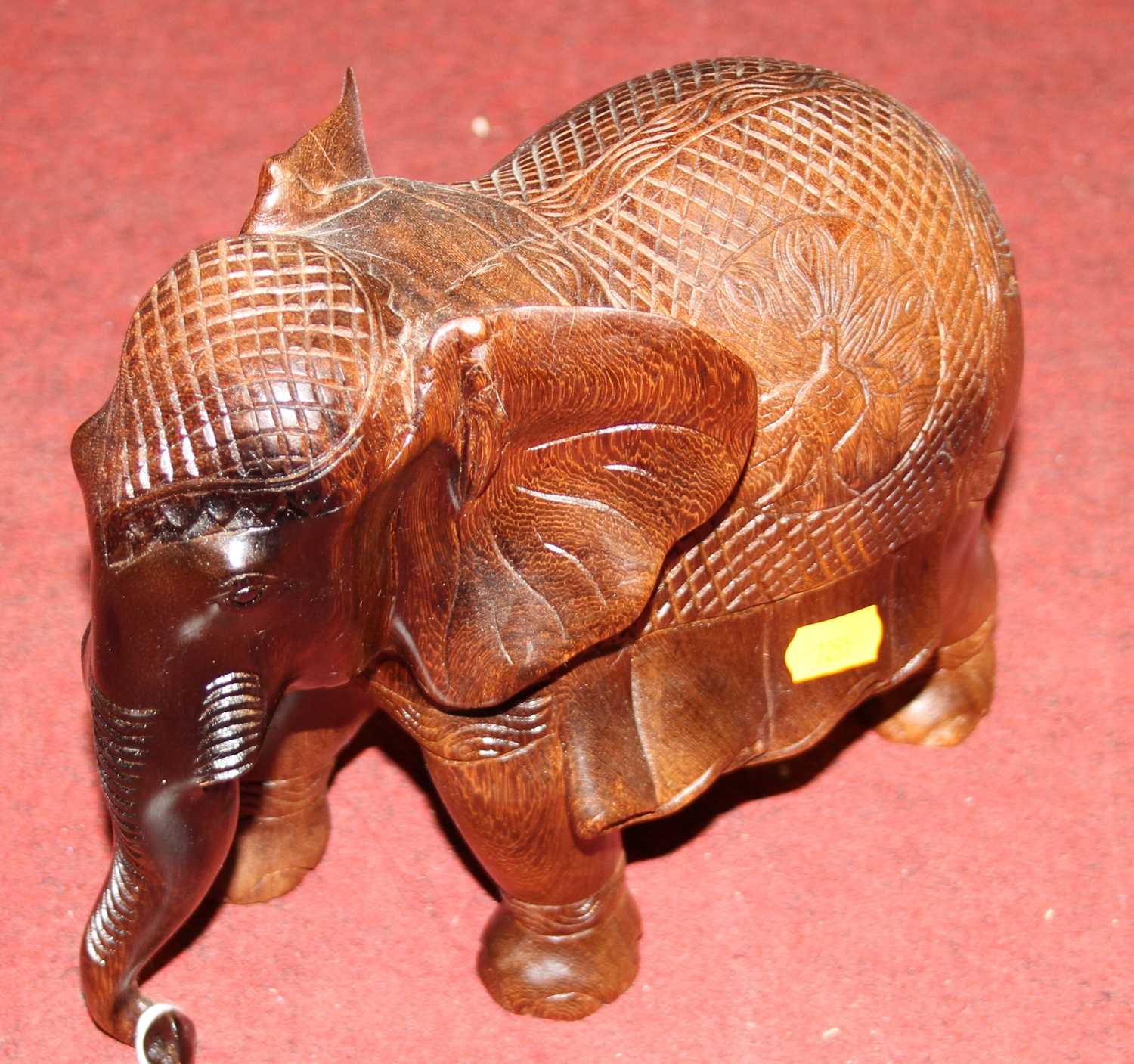 Lot 778 - An African carved hardwood model of an...