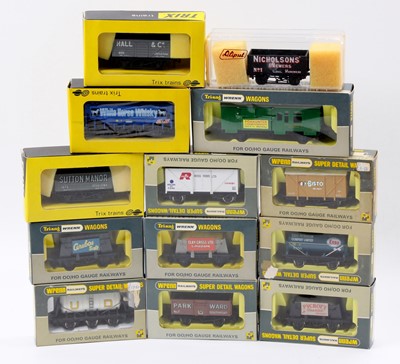 Lot 375 - Thirteen goods wagons, all boxed: 3 Trix, one...