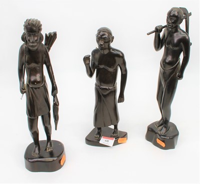 Lot 68 - A set of three African carved hardwood figures,...