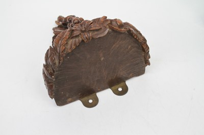 Lot 77 - A continental carved beech wall bracket in the...