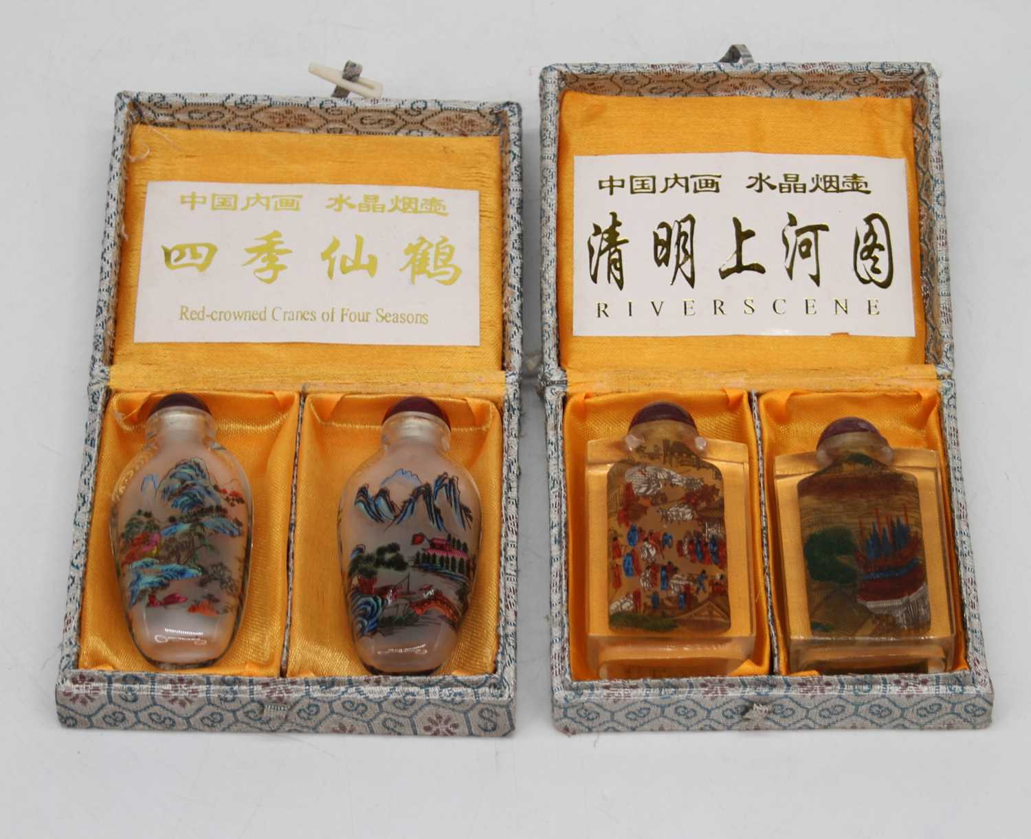 Lot 673 - Four reproduction Chinese glass snuff bottles,...