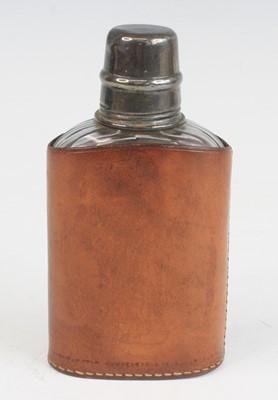 Lot 781 - A George V pocket hip flask, having a glass...