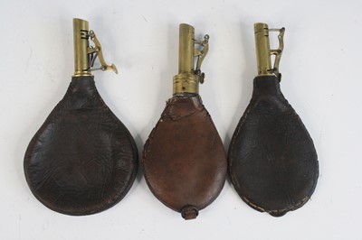 Lot 797 - A 19th century leather shot flask, of typical...