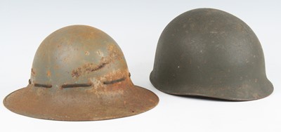 Lot 607 - A WW II steel Zuckerman helmet, the leather...