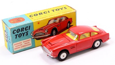 Lot 1245 - Corgi Toys No. 218 Aston Martin DB4, red body...