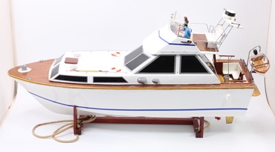 Lot 98 - A GRP hulled and wooden kit built model of a...