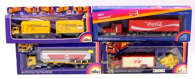 Lot 880 - Four various boxed Siku commercial vehicles to...