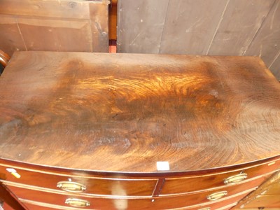 Lot 1324 - A Regency mahogany bowfront chest of two short...