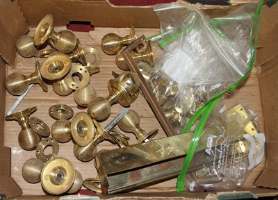 Lot 720 - A collection of brass door furniture