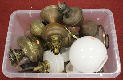 Lot 666 - A collection of Victorian brass oil lamp parts...