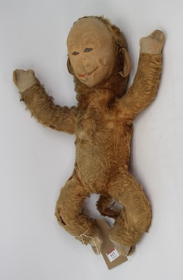 Lot 611 - A vintage mohair stuffed monkey, approx 54cm