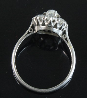 Lot 2534 - A white metal diamond circular cluster ring,...