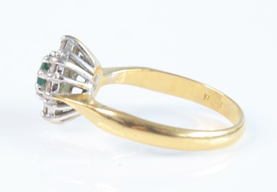 Lot 2536 - An 18ct yellow and white gold, emerald and...