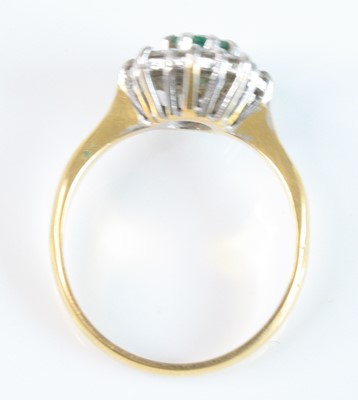 Lot 2536 - An 18ct yellow and white gold, emerald and...