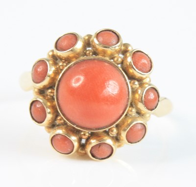 Lot 2537 - A yellow metal coral Etruscan style circular...
