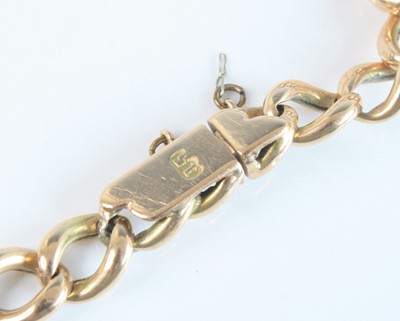 Lot 2539 - A rose metal open curblink bracelet, with box...