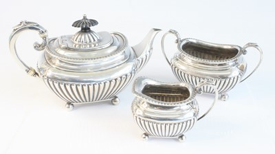 Lot 2133 - A late Victorian silver three-piece tea set,...