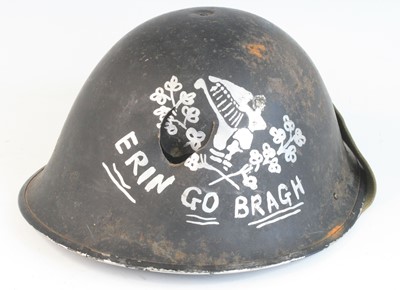 Lot 648 - A British Mk IV steel helmet shell, later...