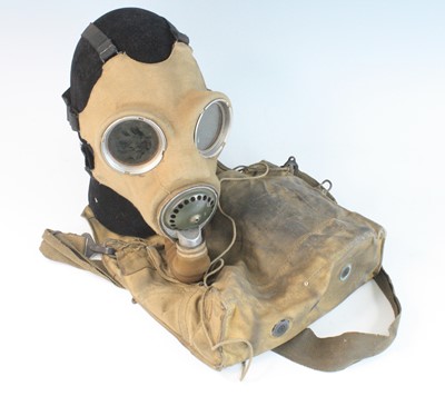 Lot 565 - A WW II British Standard Service Respirator,...