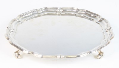 Lot 2132 - A mid-20th century silver salver, of shaped...