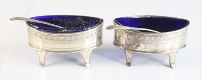 Lot 2090 - A matched pair of George III silver pedestal...