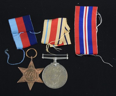 Lot 540 - Two WW II medals, to include an Italy Star and...