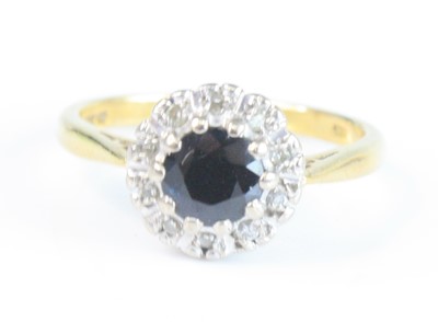 Lot 2549 - An 18ct yellow and white gold, sapphire and...