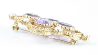Lot 2545 - A 9ct yellow gold, amethyst and pearl brooch,...