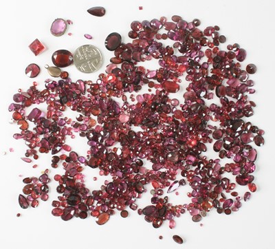 Lot 2604 - A collection of loose cut garnets, various...