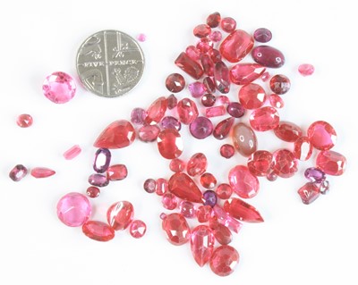 Lot 2607 - A collection of loose synthetic rubies,...