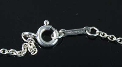 Lot 2583 - A Tiffany & Co silver 'olive leaf' pendant,...