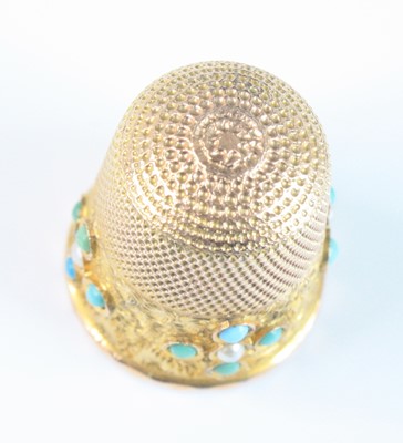 Lot 2594 - A 9ct gold, turquoise and seed pearl set...