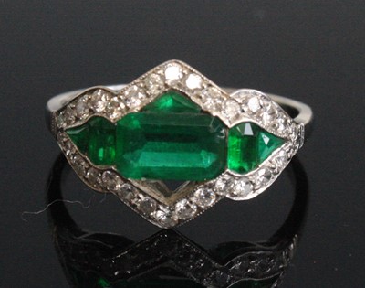 Lot 2599 - A white metal Art Deco style emerald and...