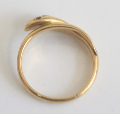 Lot 2616 - A late Victorian yellow metal snake ring, set...